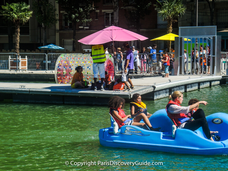 Pedal boats at Paris Plages in Bassin de la Villette Pedal boats at Paris Plages in Bassin de la Villette