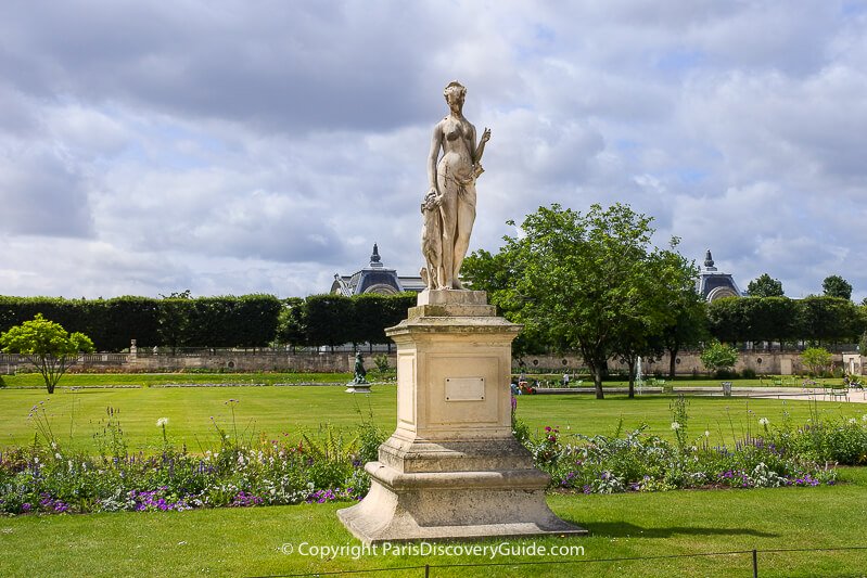 Statue in Tuileries Garden on a cloudy July day