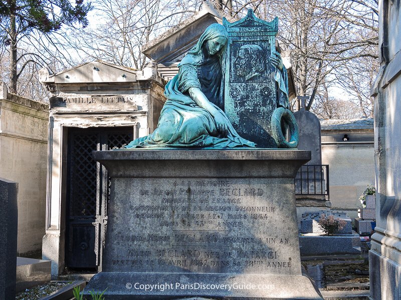 Sculpture of a sorrowful woman on the tomb of Leon Philippe Beclard