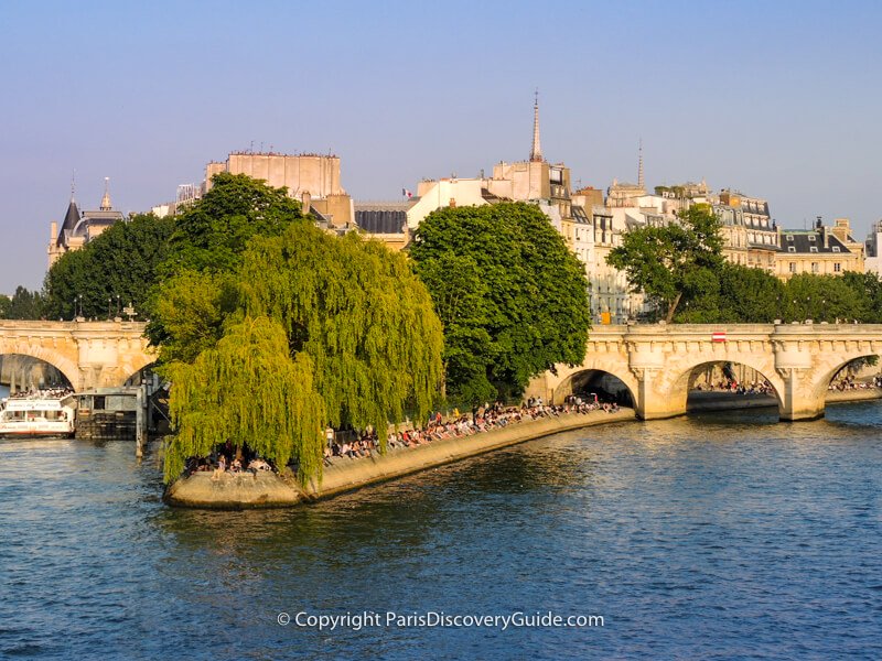 Pont Neuf bridge crossing Île de la Cité, with Square du Vert-Galant in front (photographed from the Pont des Arts bridge)