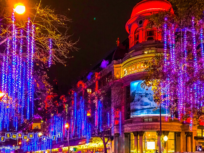 Holiday lights and decorations at Printemps and Boulevard Haussmann