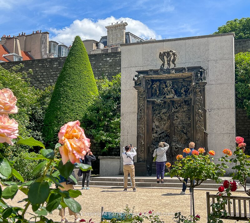 Roses blooming near Gates of Hell sculpture at Rodin Museum