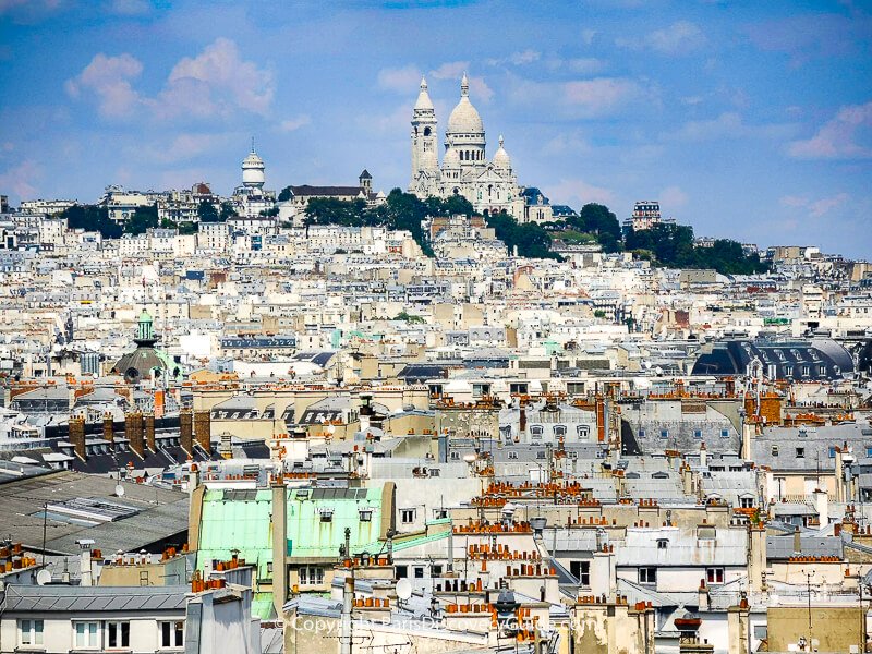 View of Sacre Coeur and Montmartre from the ferris wheel in Tuileries Garden