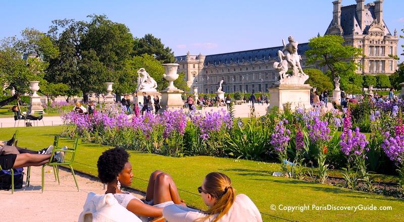 Relaxing in Jardin des Tuileries on a beautiful May afternoon in Paris Relaxing in Jardin des Tuileries on a beautiful May afternoon in Paris