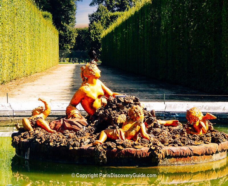 One of the fountains in the gardens at the Palace of Versailles