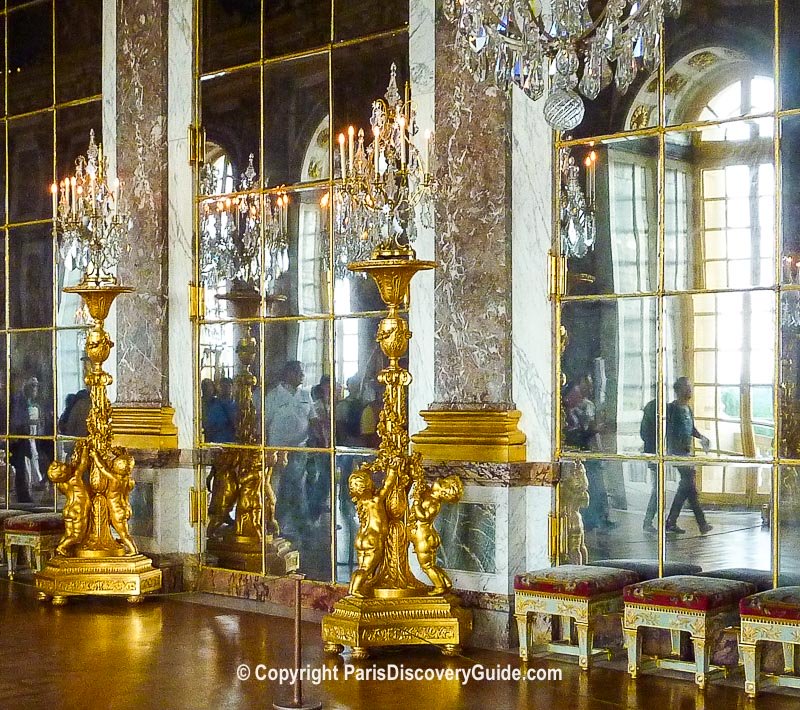 Large gold and crystal torchieres in the Hall of Mirrors