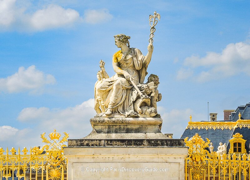 Statue in the courtyard at Palace of Versailles