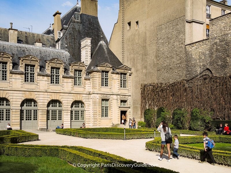 Hotel de Sully's garden in the Marais on a warm afternoon in late March