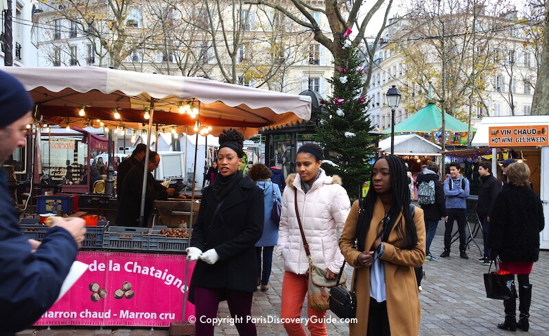 Paris Christmas Market in Montmartre, Place des Abbesses Paris Christmas Market in Montmartre, Place des Abbesses