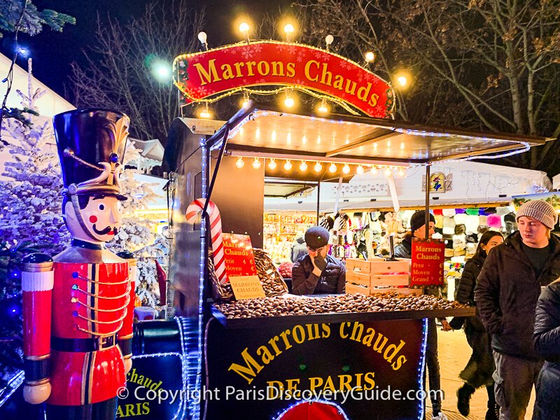 Cart selling hot roasted chestnuts at Magie de Noel