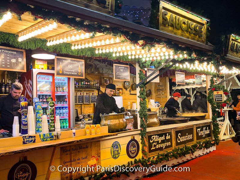 Ferris wheel and Champagne bar at Tuileries Garden Christmas Market