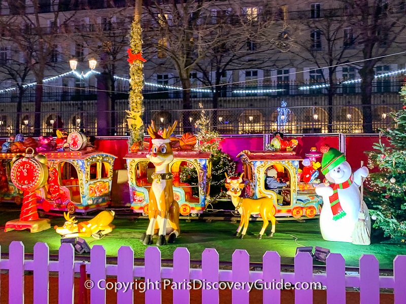 Toddler train, reindeer, and snowman at the Christmas Market