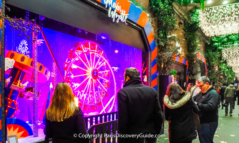 Galeries Lafayette Christmas window in the store's covered arcade facing Boulevard Haussmann 