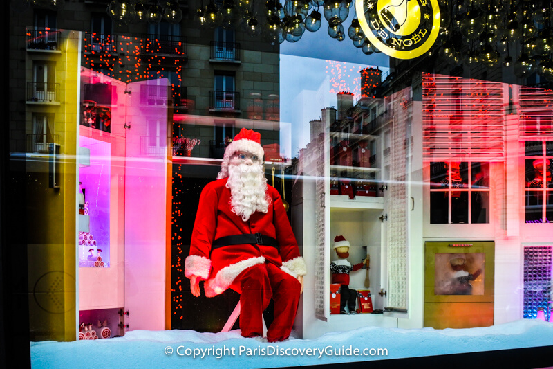 A jolly Santa in Bon Marché's window